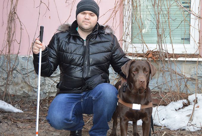 выпускник школы собак-поводырей