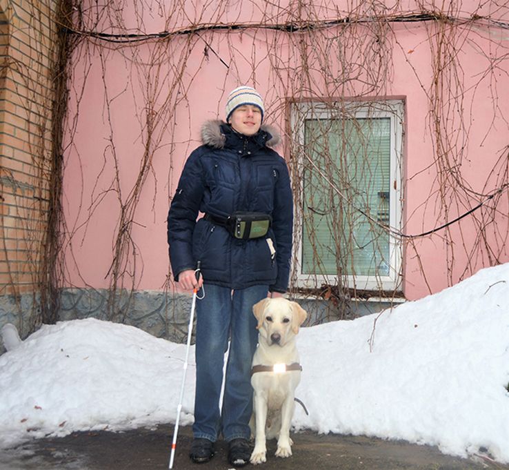 выпускник школы собак-поводырей